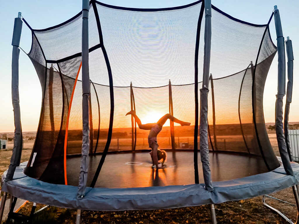 Trampoline Safety Tips - Gymnast Doing Handstand